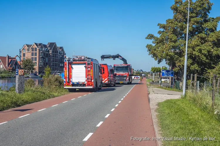 Auto te water in Beinsdorp